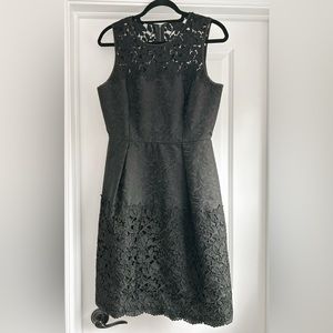 Black midi dress with embroidery detail at the bottom